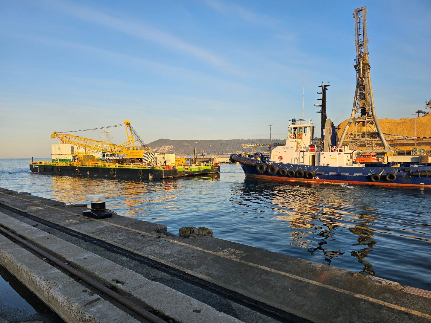 Marine barge fitted with steel sea fastening and anchorage systems